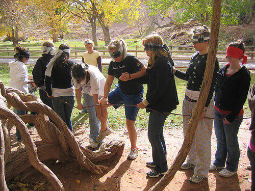 A group of New Haven students completing a recreational therapy task outdoors