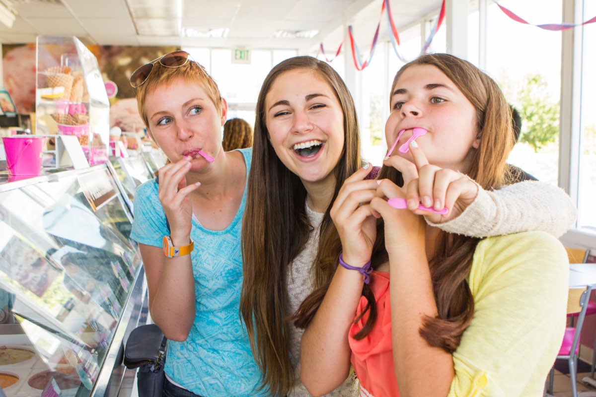 Three girls smiling Three smiling girls on an outing, New Haven Residential Treatment Center